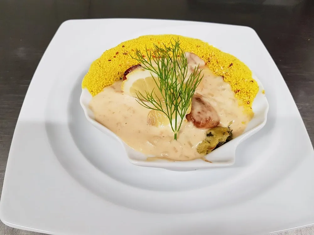 Noix de Saint Jacques Sur Fondue de Poireaux